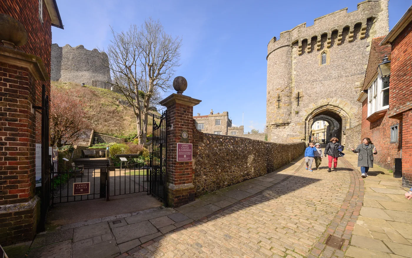 The Barbican gate and the castle walls above Lewes. The Late Night Shopping Christmas market was held in the castle grounds in 2025.